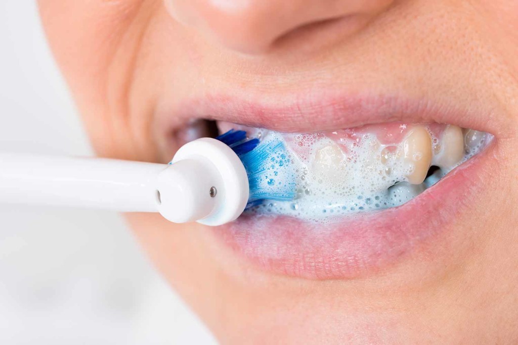 How To Brush Your Teeth Properly With An Electric Toothbrush